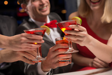 close-up of hands with glasses