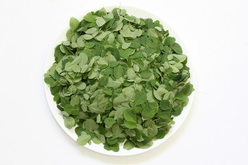 Moringa Oleifera leaves in a plate