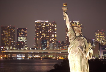 View of Tokyo at night with Rainbow Bridge