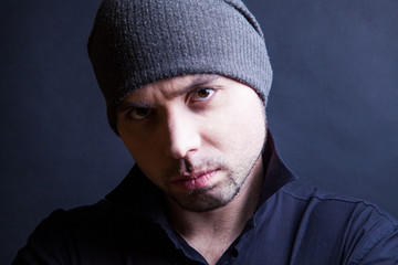 Young handsome man with serious expression