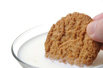 Eating cookie with milk