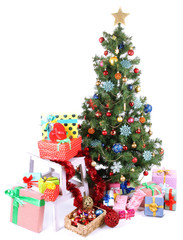 Decorated Christmas tree with gifts isolated on white