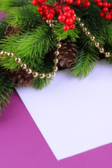 Fototapeta na wymiar Christmas card on purple background