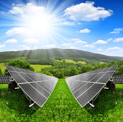 Solar energy panels in spring landscape