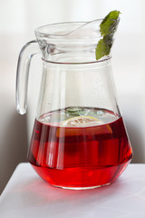 Pitcher and half berry fruit