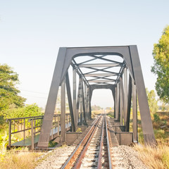 Fototapeta premium railway bridge with blue sky in Thailand.
