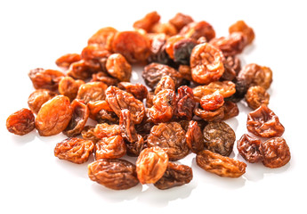 Raisins on white background