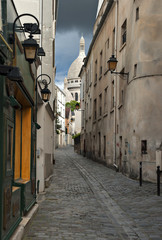 Narrow medieval street, Monmartre hills, Paris, France