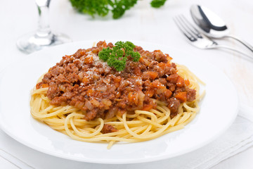 portion of spaghetti bolognese on a white plate
