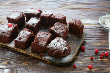 Cranberry brownie pieces on the board