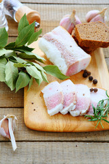 salty bacon with bread and spices