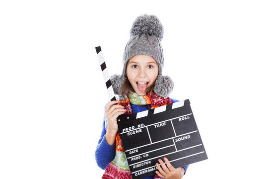 Little girl with a clapperboard