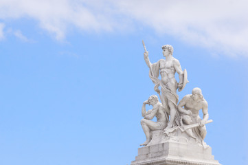 Fototapeta na wymiar three men statue at National Monument of Victor Emmanuel II