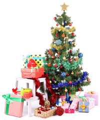 Decorated Christmas tree with gifts isolated on white