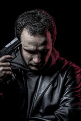 Risk, thief, armed man with black leather jacket, dangerous