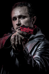 Mafia, thief, armed man with black leather jacket, dangerous