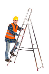 Construction worker in reflective clothing climbing a ladder.