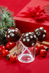 Chocolate cake pops decorated with sugar stars