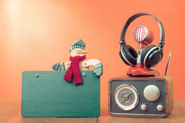 Greeting card with snowman, retro radio, microphone, headphones