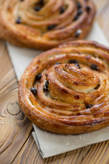 Vertical shot of sweet french roll buns, close-up