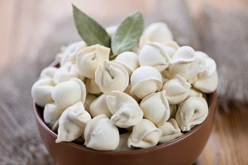Close-up of raw pelmeni, traditional russian cuisine