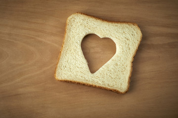 Slice of bread with cut out heart shape