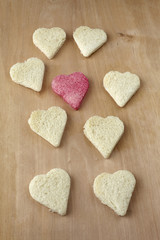 Obraz premium Red colored heart shape of bread