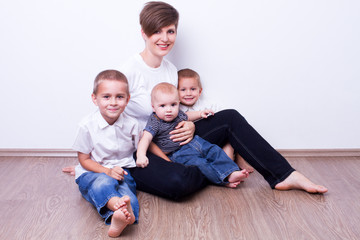 Happy mother and her smiling children