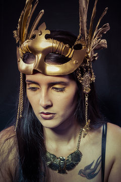 Tattoo, Warrior woman with gold mask, long hair brunette. Long h