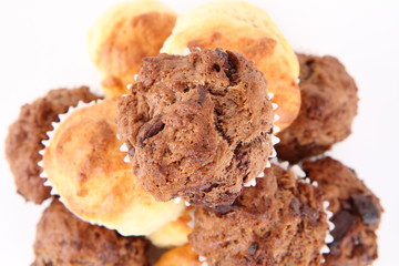 Lemon and chocolate muffins on a white background