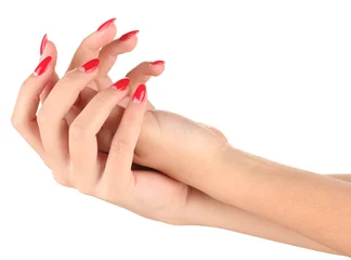 Poster Beautiful female hands with red nails isolated on white © Africa Studio