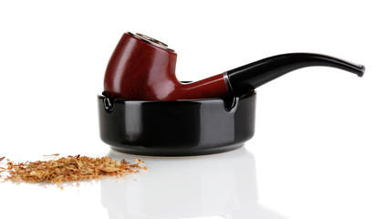 Smoking pipe and tobacco isolated on white