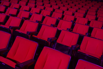 Rows of empty theater seats