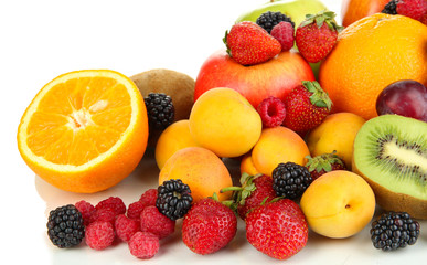 Fresh fruits and berries isolated on white