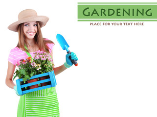 Beautiful girl gardener with flowers isolated on white