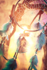 dreamcatcher on a forest at sunset © fergregory