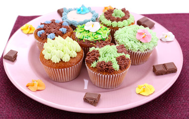 Tasty cupcakes with butter cream,