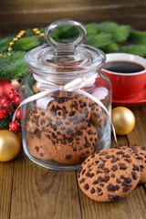 Delicious Christmas cookies in jar on table close-up