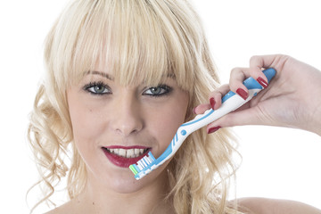 Young Woman Brushing Teeth