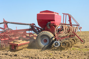 Obraz premium Seeder in the field close up