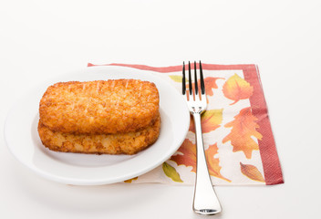 Delicious breakfast with fresh golden hash brown.
