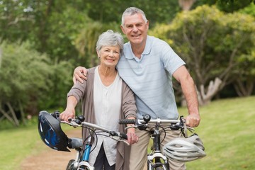 Fototapeta premium Senior couple on cycle ride at the park