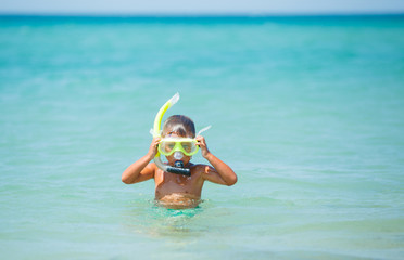 Happy boy on beach