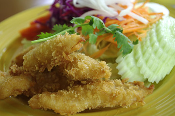 fried fish and salad healthy meal