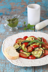 salad from zucchinis and tomatoes