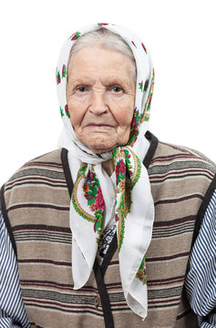 Portrait Of A Senior Woman In Headscarf Looking At The Camera