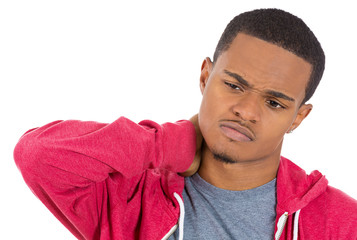 Stressed young man having neck pain, white background 