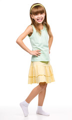 Fototapeta premium Little girl is standing