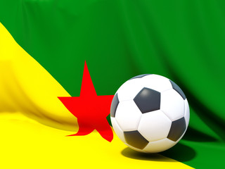 Fototapeta premium Flag of french guiana with football in front of it