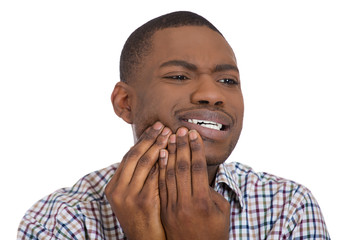 Young man having toothache